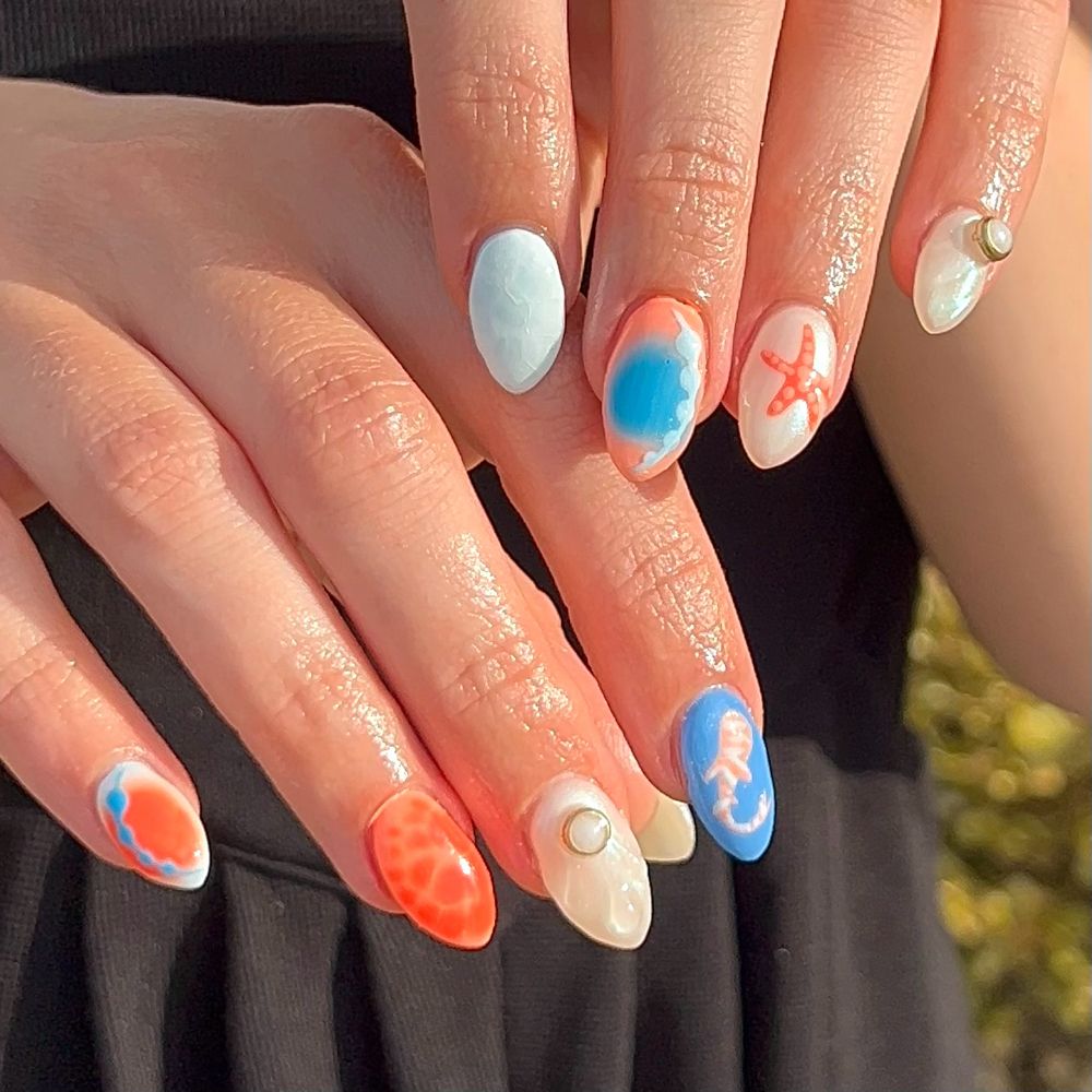 Orange and blue abstract nails